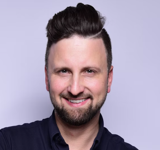 Man smiling studio portrait